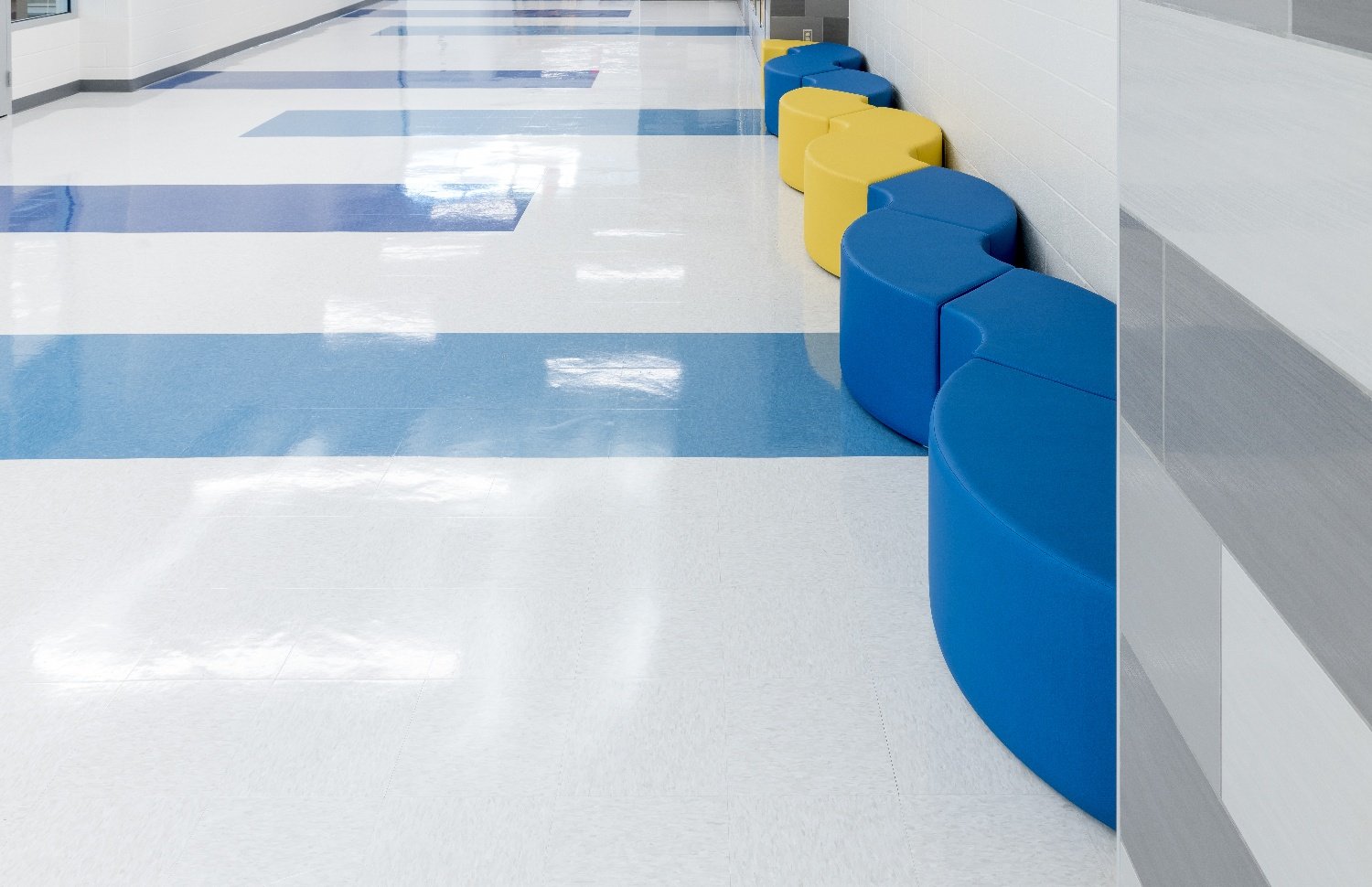learning hallway, arcs, curved bench, soft seating