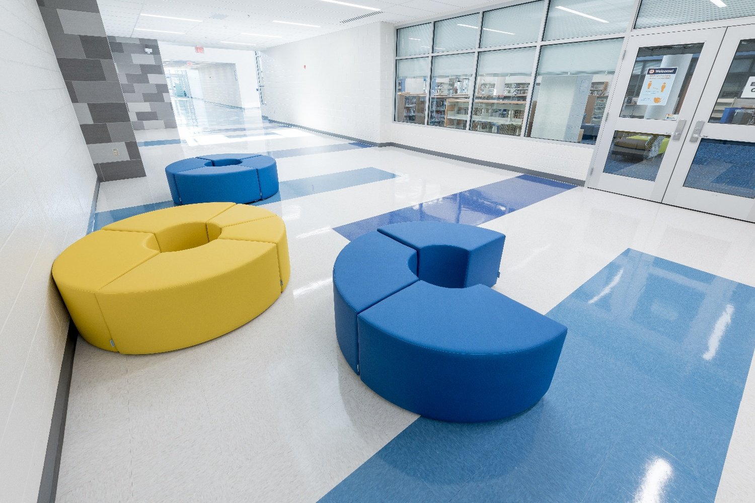 learning hallway, arcs, curved bench, soft seating