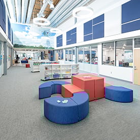 2-step, two step, 2 step, arc, curved, bookshelf, bookcase, mobile storage Georgetown learning hallways collaborative project